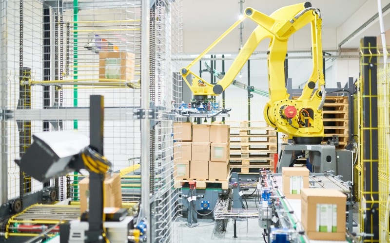 a factory setting with a bunch of automated machines