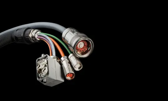 Close-up of customised cable assemblies with labeled wires and connectors.