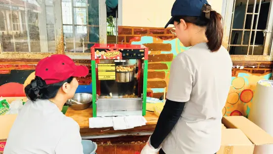 Setting up a buttered popcorn booth