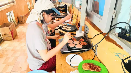Setting up a pancake booth