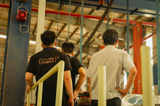 Our engineers and employees of Kim Tin Group are checking the cable system in the factory.