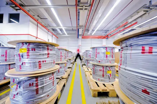 Cable drums in the goods receiving area at HELU