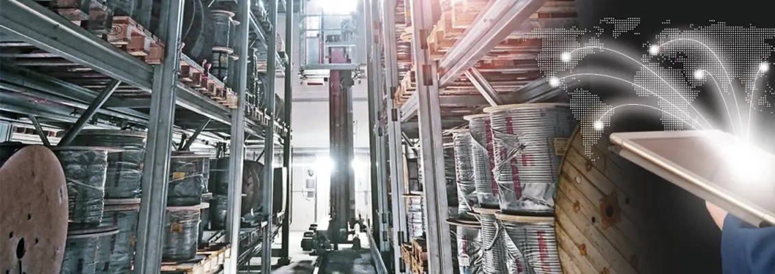Man holding a tablet in a logistics warehouse