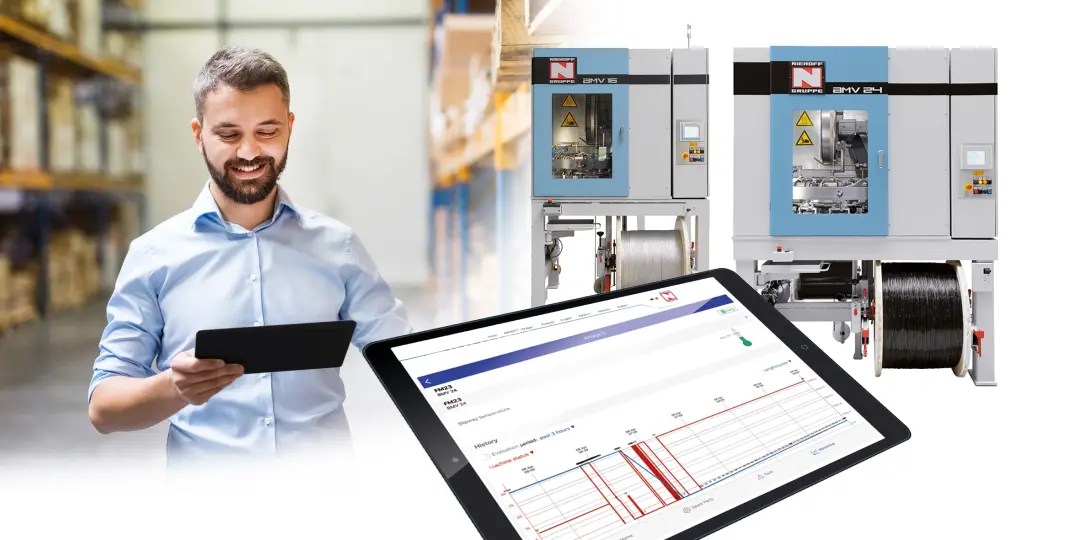 Mann schaut auf Tablet vor Niehoff maschine