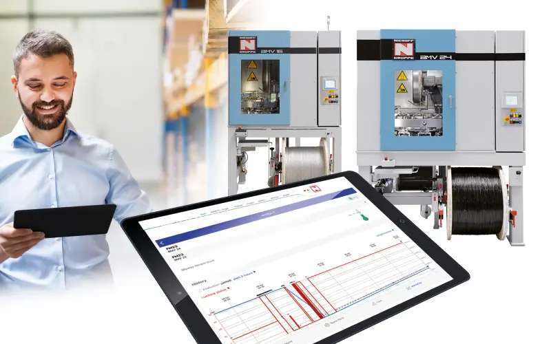 Man holding a tablet in a warehouse