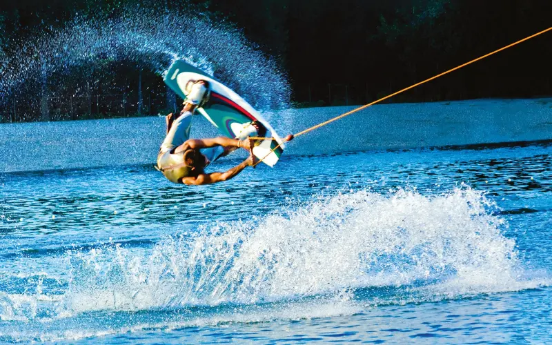 Wakeboarder does a flip