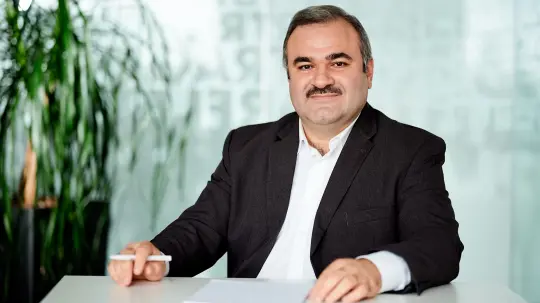 Ömer Durak at a table