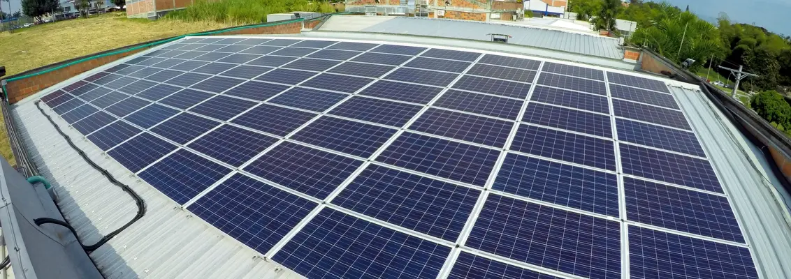 Exterior shot of the Audifarma roof with solar panels on top