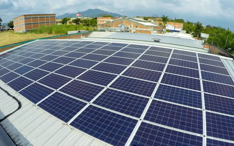 Exterior shot of the Audifarma roof with solar panels on top