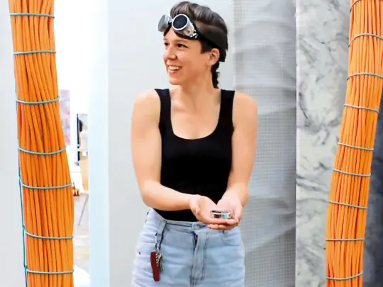 Maria Euler holding a compass