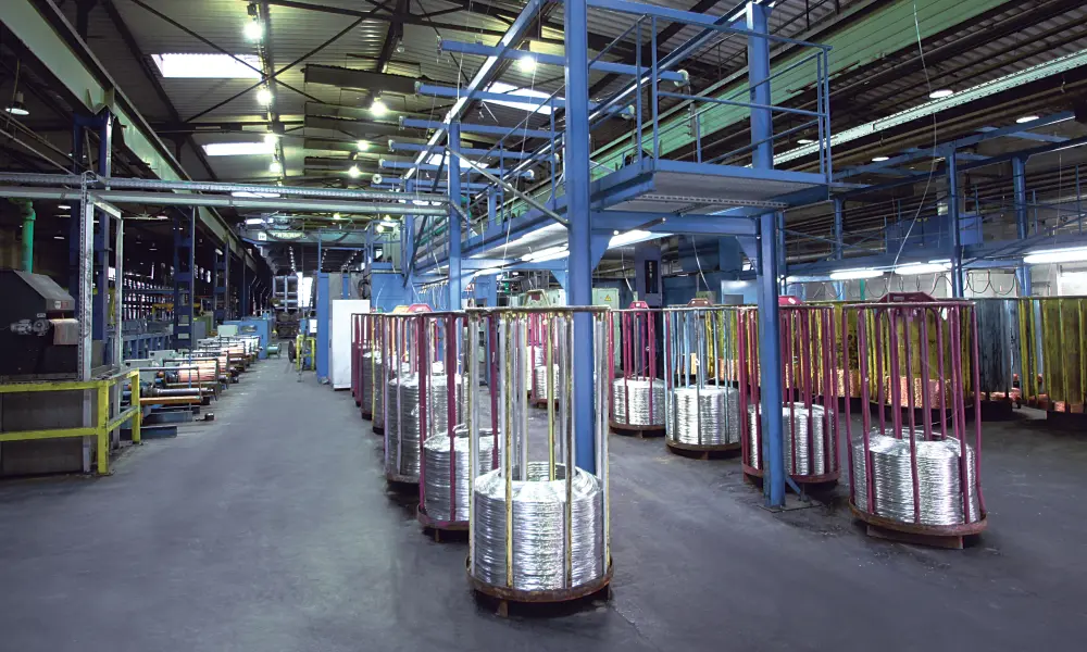 Tin plated copper wires are prepared for the wire drawing process.