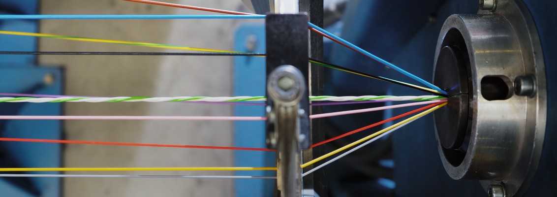Cables in different colors being layed up 